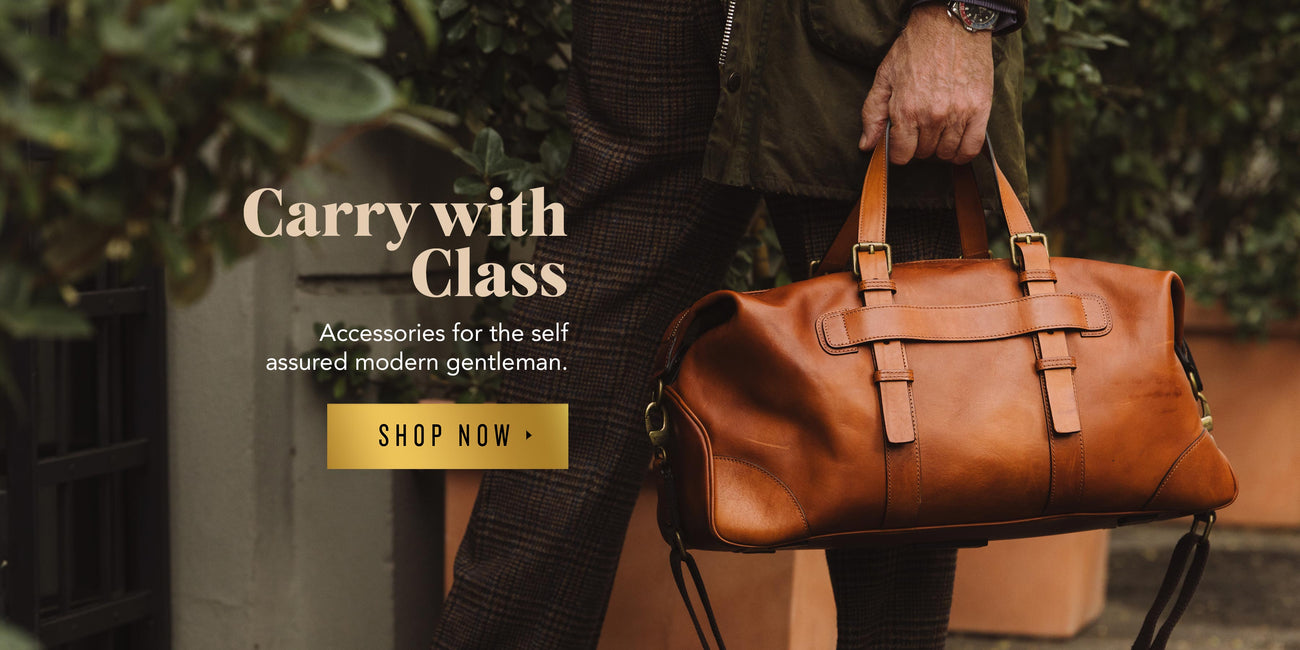 a man holding a brown bag